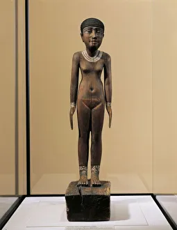 Figurine of a naked woman with broken thumbs, found wrapped in a linen cloth in a tomb at Figurine of a naked woman with broken thumbs, found wrapped in a linen cloth in a tomb at