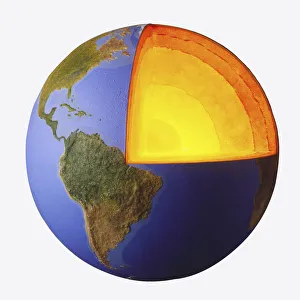 Globe with removed section illustrating Earths mantle lit by a torch Globe with removed section illustrating Earths mantle lit by a torch