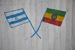 Israeli and ethiopian flags painted on the gate of an association supporting the Jewish Israeli and ethiopian flags painted on the gate of an association supporting the Jewish