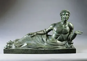Lid of a cinerary urn with a portrait of a reclining young man, 400/375 B.C., bronze Lid of a cinerary urn with a portrait of a reclining young man, 400/375 B.C., bronze