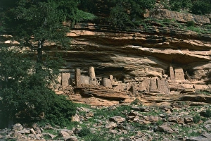 Mali, Mopti Region, Banani, Cliff of Bandiagara, Ancient Tellem houses carved in rock Mali, Mopti Region, Banani, Cliff of Bandiagara, Ancient Tellem houses carved in rock