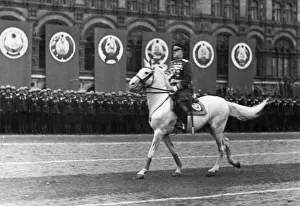 Marshal georgy zhukov riding across red square, reviewing the troops Marshal georgy zhukov riding across red square, reviewing the troops