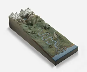 Model of winding river flowing from mountains to sea Model of winding river flowing from mountains to sea