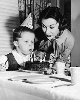 Mother and daughter celebrating birthday Mother and daughter celebrating birthday