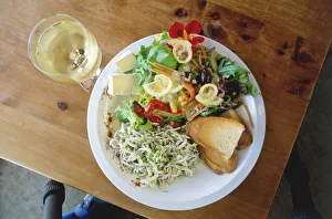 Overhead view of a plate containing whitebait and salad, a traditional New Zealand meal Overhead view of a plate containing whitebait and salad, a traditional New Zealand meal