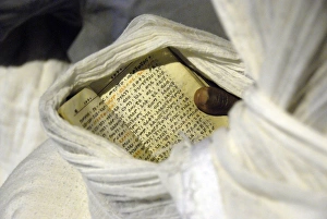 Pilgrim reading aprayer book in Lalibela Pilgrim reading aprayer book in Lalibela