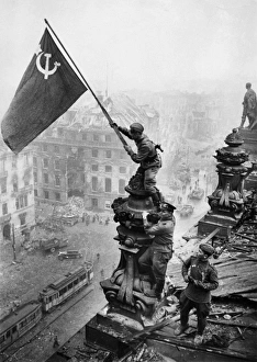 Red army soldiers raising the soviet flag over the reichstag in berlin, germany, april 30, 1945 Red army soldiers raising the soviet flag over the reichstag in berlin, germany, april 30, 1945