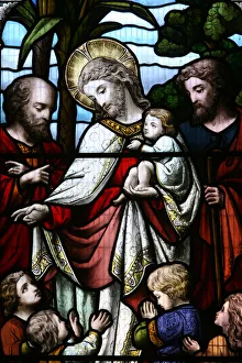 Stained glass window depicting Jesus welcoming children Stained glass window depicting Jesus welcoming children