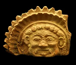Terracotta antefix with relief of gorgoneion Terracotta antefix with relief of gorgoneion
