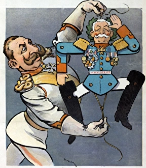 Wilhelm II holding strings of wooden jumping toy