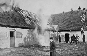 World War I 1914-1918: Fighting a fire on a farm in Artois, France, set alight by World War I 1914-1918: Fighting a fire on a farm in Artois, France, set alight by