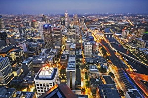 Aerial view of the city centre of Melbourne illuminated at dusk Aerial view of the city centre of Melbourne illuminated at dusk