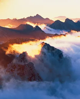 Australia, Tasmania, mountains and fog at sunrise Australia, Tasmania, mountains and fog at sunrise