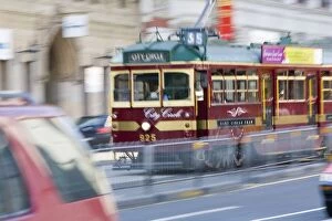 Victoria (VIC) Collection: Australia, Victoria, Melbourne, streetcar (blurred motion)