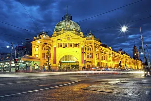 Facade of Flinders Street station illuminated at night Facade of Flinders Street station illuminated at night