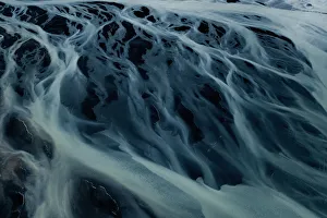 Glacial river flows in the southern region of Iceland Glacial river flows in the southern region of Iceland