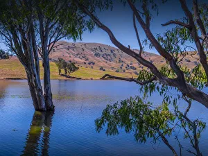 Hume lake in summer, bursting to capacity after spring rains, in the Upper Murray region Hume lake in summer, bursting to capacity after spring rains, in the Upper Murray region