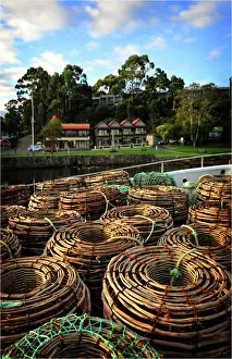 Southern lightscapes australia/lobster pots stacked strahan wharf Southern lightscapes australia/lobster pots stacked strahan wharf