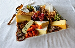 A platter of local King Island produce. Soft and hard cheeses produced in the Cheese factory at Porkies Creek A platter of local King Island produce. Soft and hard cheeses produced in the Cheese factory at Porkies Creek