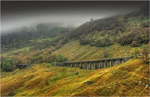 Rail Transportation Collection: A railway viaduct in mist, near Callander, Scottish highlands