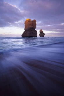 Great Ocean Road Collection: Two sea stacks at Gibsons Steps and a receding wave, Great Ocean Road, Victoria, Australia