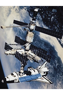 Space Shuttle Atlantis docked to the Kristall module Space Shuttle Atlantis docked to the Kristall module