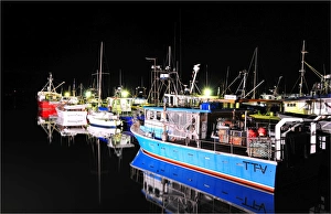 St-Helens commercial fishing wharf at night, east coastline of Tasmania, Australia St-Helens commercial fishing wharf at night, east coastline of Tasmania, Australia