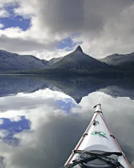 Tranquil paddle on Lake St Clair, Tasmania, Aust Tranquil paddle on Lake St Clair, Tasmania, Aust