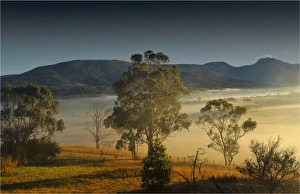 Winters morning with mist rising at dawn in the Huon Valley in southern Tasmania Winters morning with mist rising at dawn in the Huon Valley in southern Tasmania