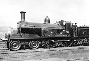 Driver and fireman in the cab of a 4-4-0 locomotive number 421 on the North British Railway Driver and fireman in the cab of a 4-4-0 locomotive number 421 on the North British Railway