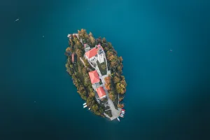 Aerial view of the Pilgrimage Church of the Assumption of Maria on Bled Island in Bled Aerial view of the Pilgrimage Church of the Assumption of Maria on Bled Island in Bled