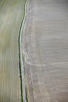Aerial view, road through a field in the Elbe Sandstone Mountains, Saxony, Germany, Europe Aerial view, road through a field in the Elbe Sandstone Mountains, Saxony, Germany, Europe