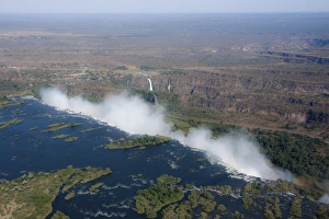 Aerial view, smoke cloud at Victoria Falls, Livingstone, Zambia Aerial view, smoke cloud at Victoria Falls, Livingstone, Zambia