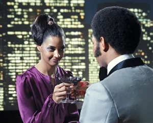 African-American Couple Man Woman Toasting Wine Glasses Romance Night Skyline Dress African-American Couple Man Woman Toasting Wine Glasses Romance Night Skyline Dress