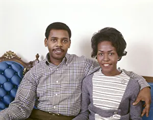 African-American Couple Sitting On Couch Retro 1970 1970s African-American Couple Sitting On Couch Retro 1970 1970s