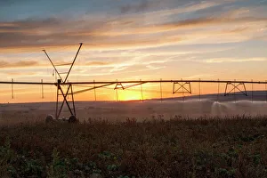 Agricultural Landscape Picture of Center Pivot Irrigation at Sunset on Farm in Magaliesburg, North West Province Agricultural Landscape Picture of Center Pivot Irrigation at Sunset on Farm in Magaliesburg, North West Province