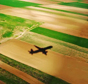 Airplane shadow on farm fields in Austria Airplane shadow on farm fields in Austria