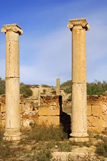 Ancient columns iwith ionic capital, ruins of the Roman City Leptis Magna, Libya Ancient columns iwith ionic capital, ruins of the Roman City Leptis Magna, Libya