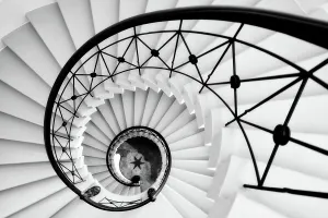 Prints of Spiral staircase with black star on ground Architecture Prints: Spiral Staircase Print with Black Star