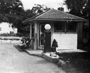 archival, black & white, c, caucasian, full-length, gas pump, gas station, historical archival, black & white, c, caucasian, full-length, gas pump, gas station, historical