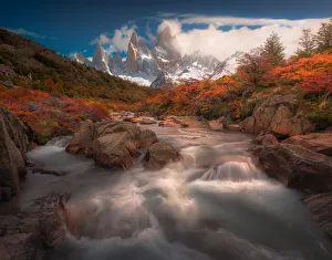 Autumn view of cascade in Patagonia with Mount Fitzroy background Autumn view of cascade in Patagonia with Mount Fitzroy background