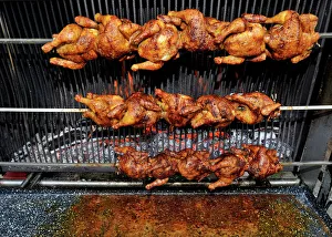 BBQ grilled chicken, chicken on rotating skewers BBQ grilled chicken, chicken on rotating skewers