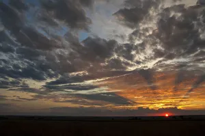 A Beautiful African sunset with sun rays over the agricultural farm lands of the North A Beautiful African sunset with sun rays over the agricultural farm lands of the North