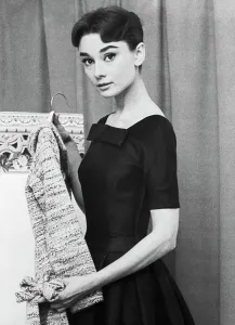 Audrey Hepburn Holding Coat by Givenchy Print, 1956