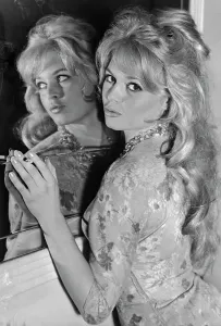 London Airport Arrivals Prints: Brigitte Bardot Posing with Mirror Reflection