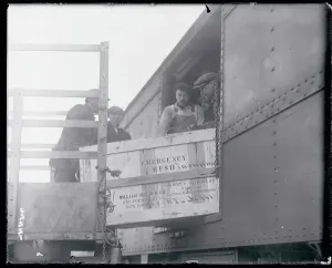 Men Loading Crates onto Train Print