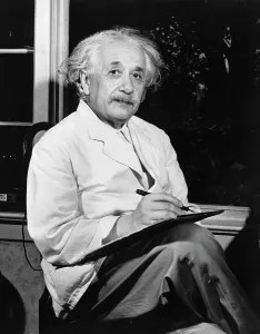 Framed Print : Albert Einstein Seated at Desk Print