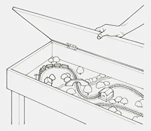 Black and white illustration of hand opening lid of a box containing a train set Black and white illustration of hand opening lid of a box containing a train set