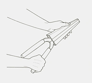 Black and white illustration of hands putting garden shears in protective case Black and white illustration of hands putting garden shears in protective case
