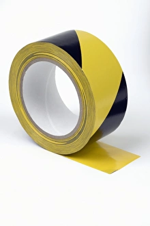 Black and yellow warning tape for underground conduit Black and yellow warning tape for underground conduit